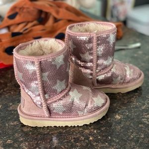 UGG classic short boot in pink sequins with white/silver stars. Size 8